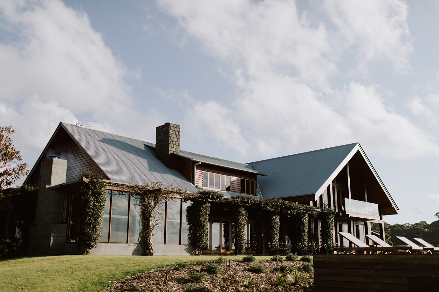 Spicers Peak Lodge timber and stone lodge against the sky
