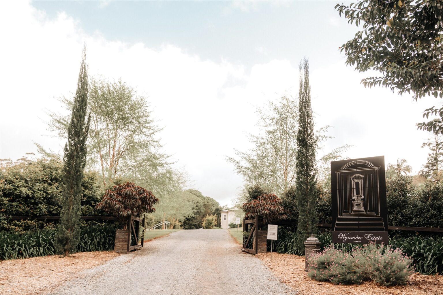 Cypress-lined driveway entrance to Wynmère Estate