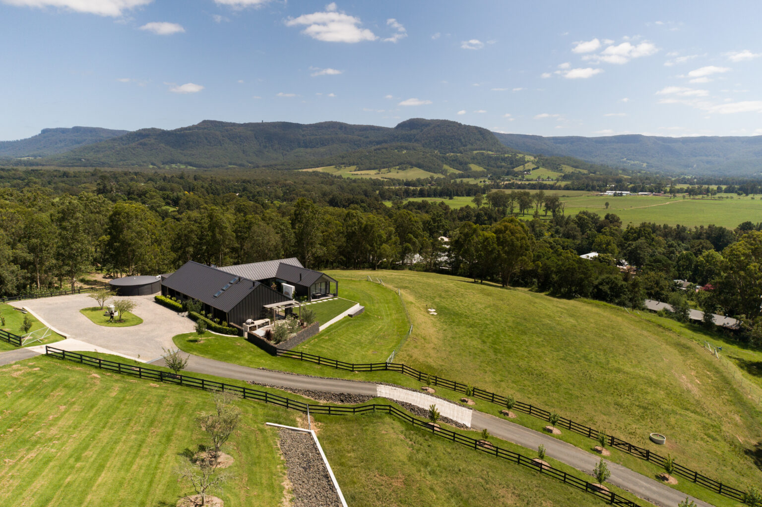 Aerial view of La Belle Vallée homestead and rolling farmland, Kangaroo Valley