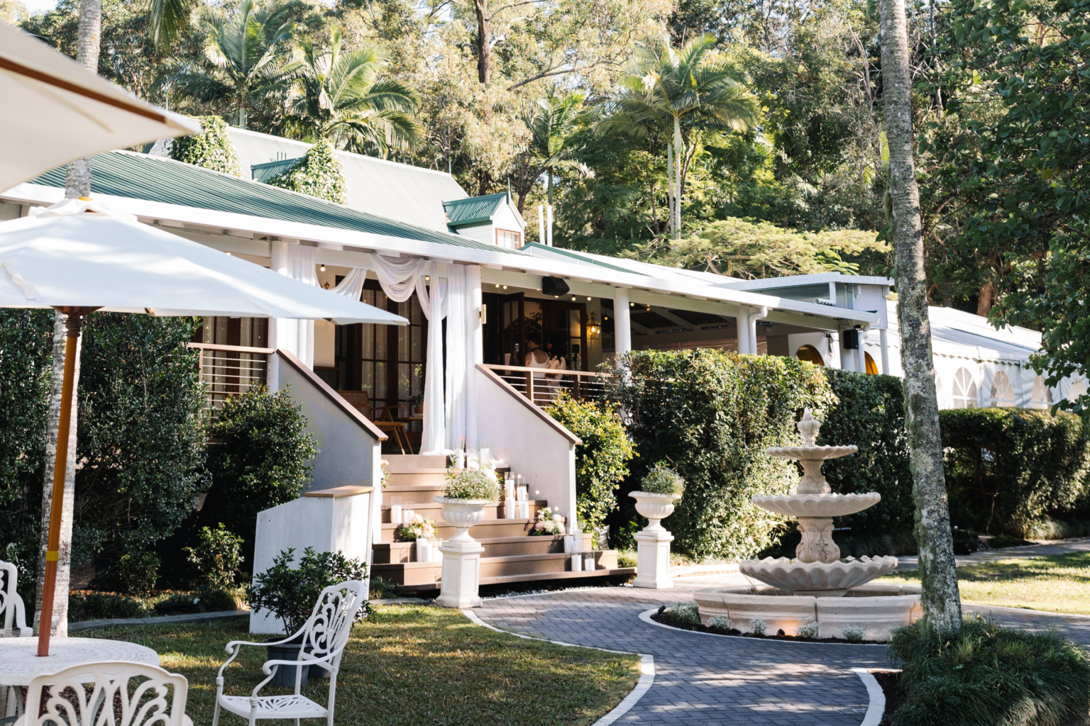 Homestead verandah and fountain garden at Coolibah Downs