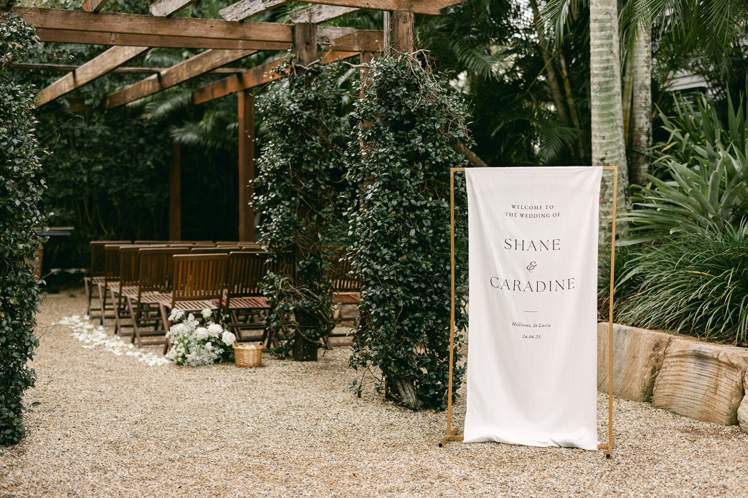 Welcome sign at the Courtyard Garden ceremony setting
