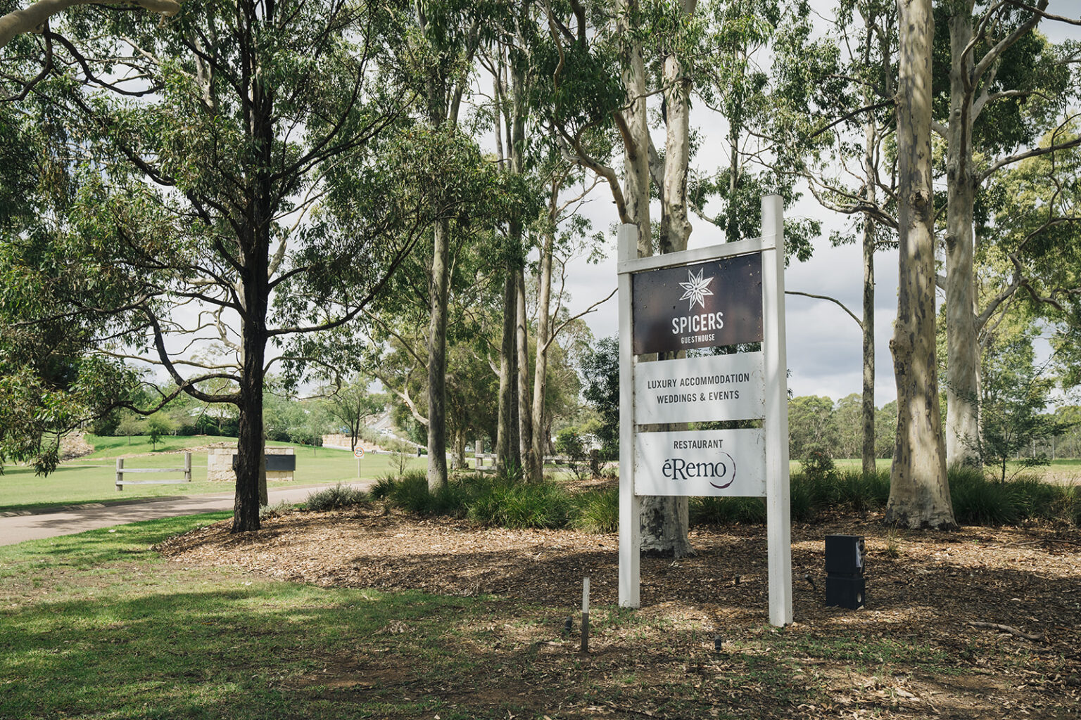 Spicers Guesthouse entrance sign among the trees