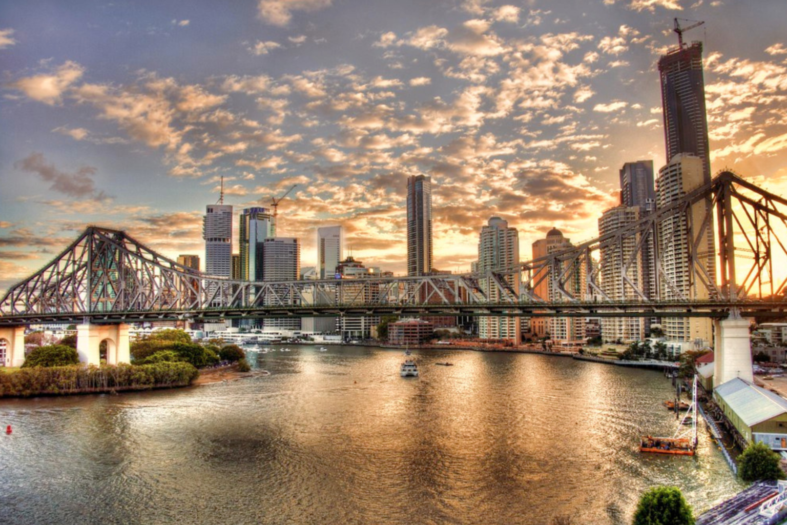 Story Bridge and Brisbane city skyline at sunset