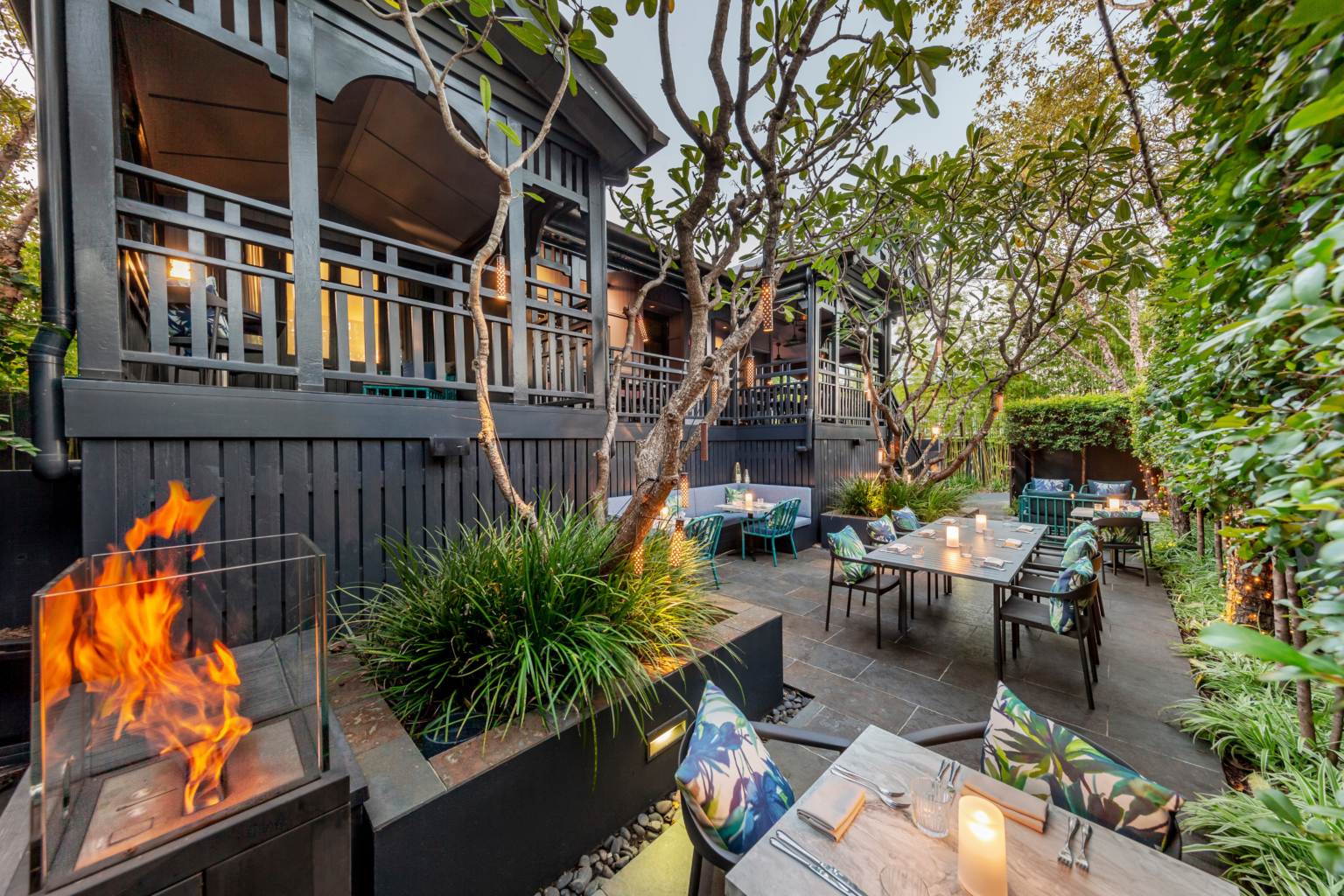 Rooftop terrace with fire pit and dining tables at Spicers Balfour Hotel