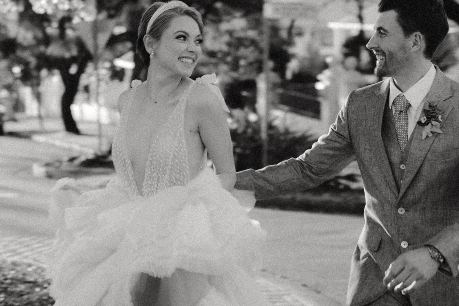 Black-and-white photo of a couple dancing in the street, Potts Point