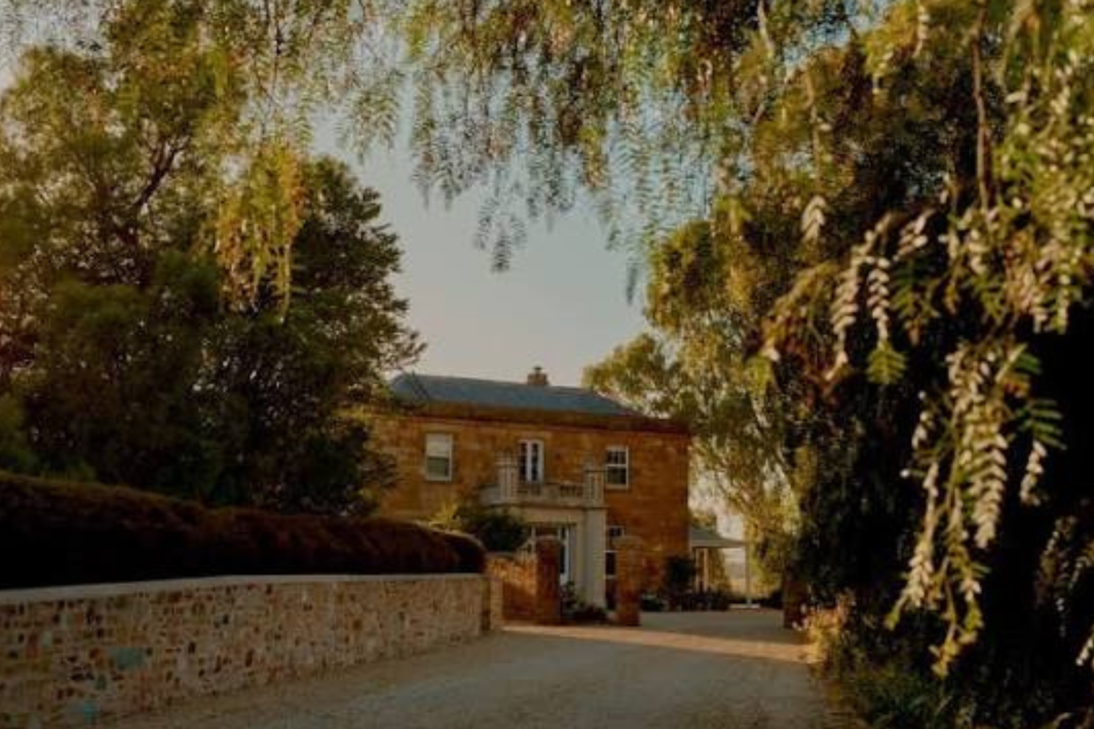 Kingsford homestead glimpsed through the trees at dusk, Barossa Valley