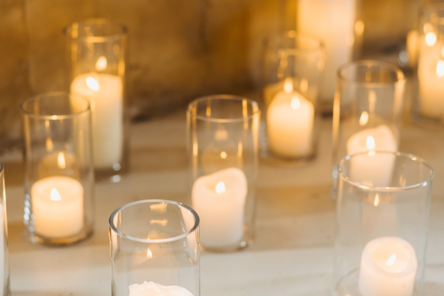 Close-up of glowing pillar candles